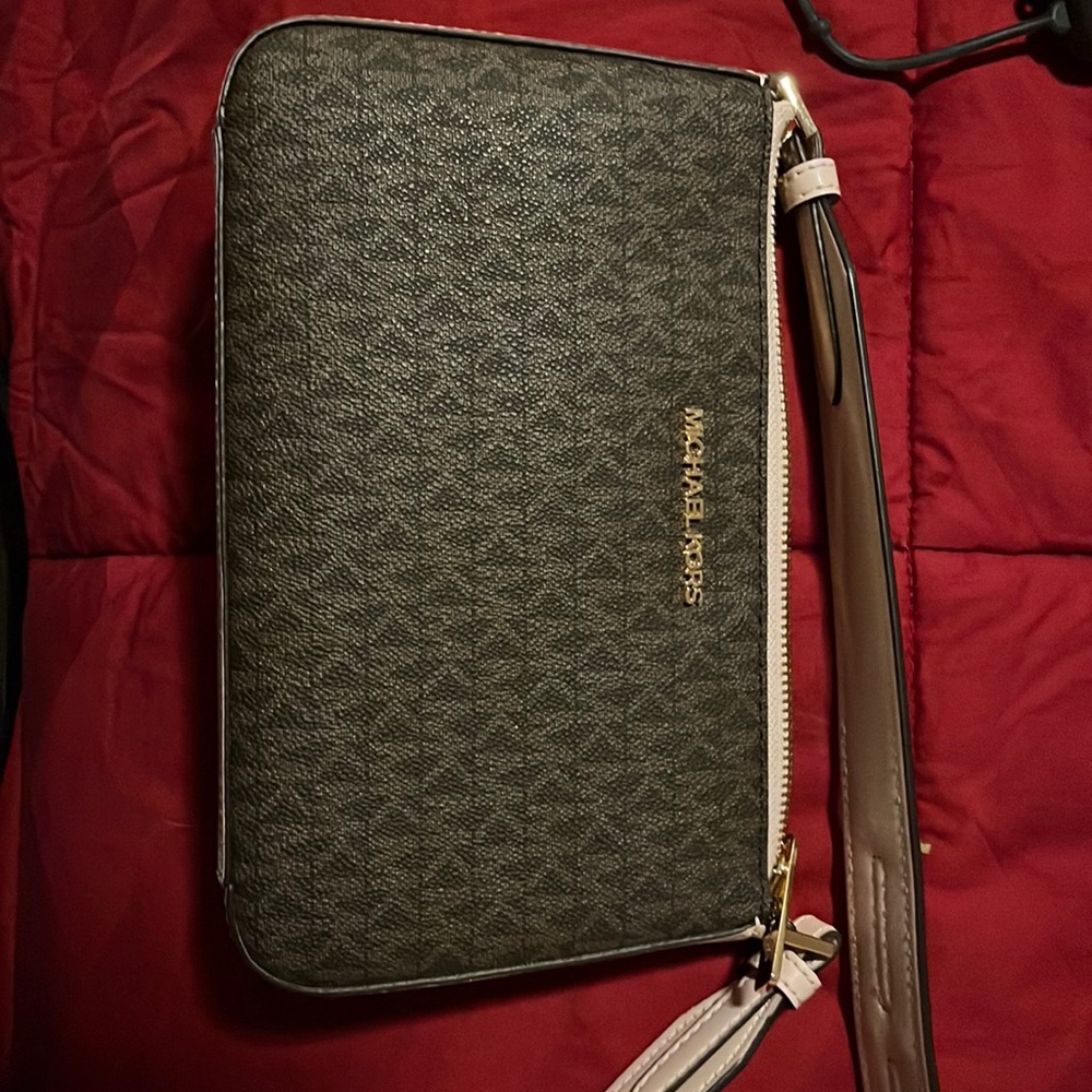 Never been used brown and pink small MK purse